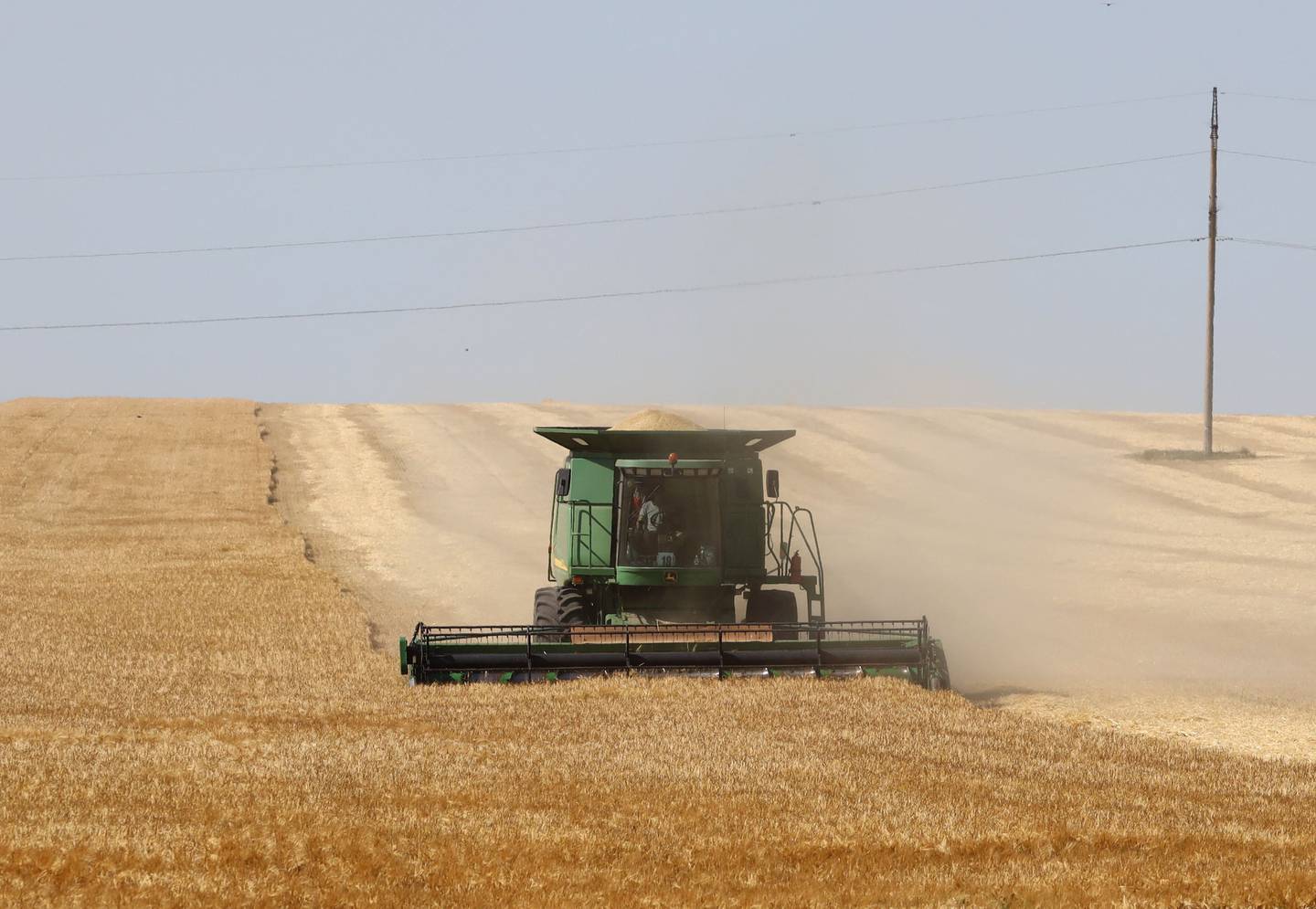 A farmer harvests wheat near Izmail, in the Odessa region on Ukraine. AFP