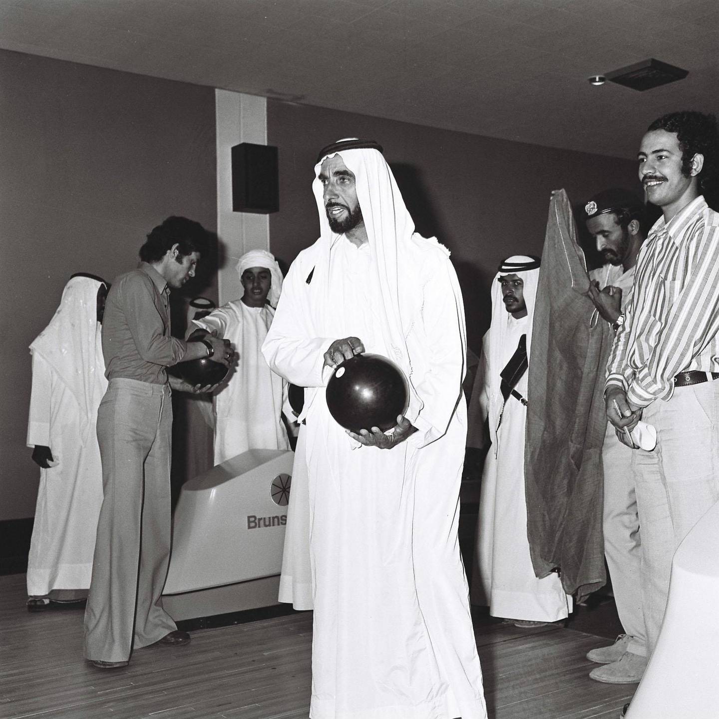 An image from the Itihad archive. Courtesy Al Itihad. Abu Dhabi, UAE. 1975. Sheikh Zayed inspecting the expansion of Tourist Club area. Third from left is Sheikh Mohammed Bin Zayed, now Crown Prince of Abu Dhabi *** Local Caption *** 000012.JPG