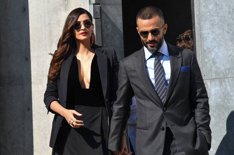 Indian businessman Anand Ahuja and Bollywood actress Sonam Kapoor at the spring/summer 2019 Armani fashion show in Milan. AFP