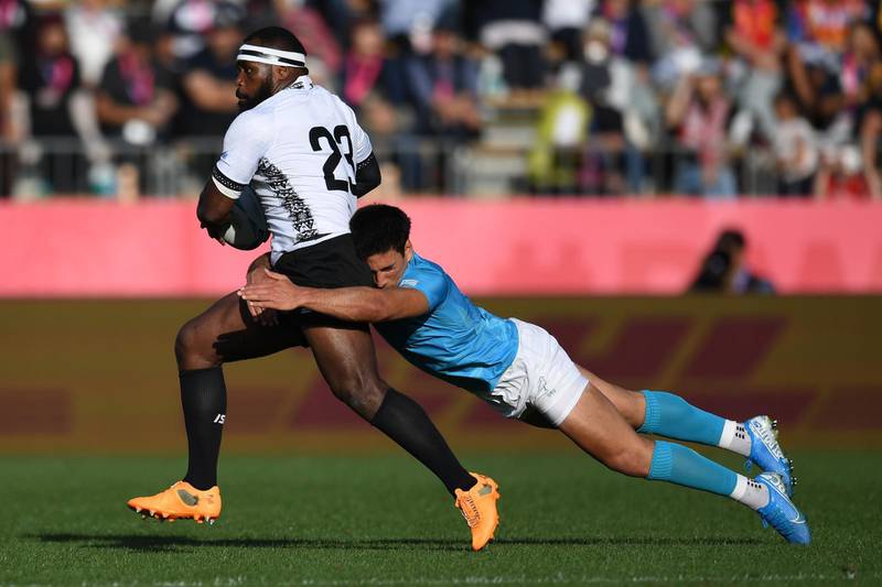 Fiji's centre Levani Botia (L) is is tackled by Uruguay's centre Juan Manuel Cat during the Japan 2019 Rugby World Cup Pool D match between Fiji and Uruguay at the Kamaishi Recovery Memorial Stadium in Kamaishi.  AFP
