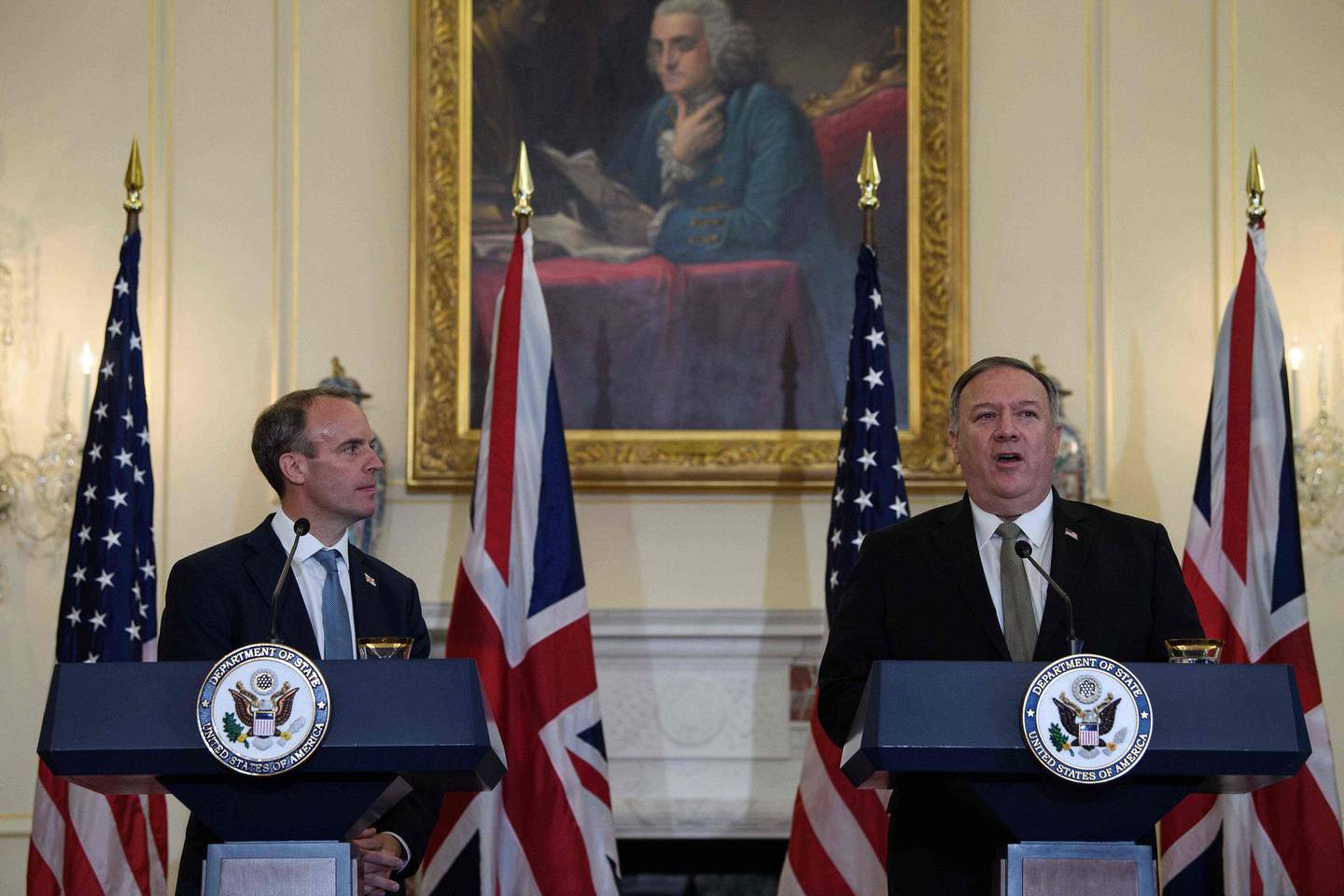 US Secretary of State Mike Pompeo (R) speaks at a press conference with British Foreign Secretary Dominic Raab at the State Department in Washington, DC, on September 16, 2020. / AFP / POOL / NICHOLAS KAMM
