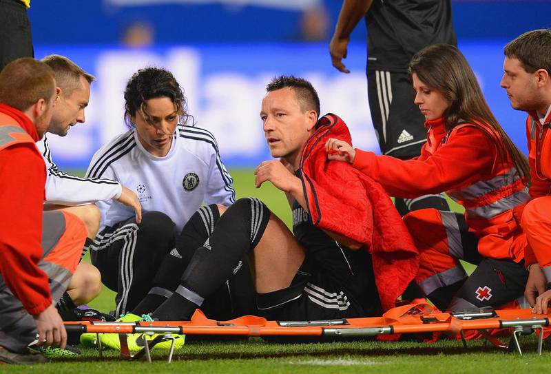 An injured John Terry of Chelsea receives treatment during his side's draw with Atletico Madrid in the Champions League on Tuesday night. Mike Hewitt / Getty Images / April 22, 2014
