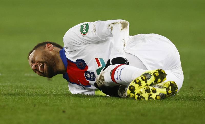 Paris Saint-Germain attacker Neymar lies injured on the pitch during his team's French Cup win over over Caen on February 10. Reuters