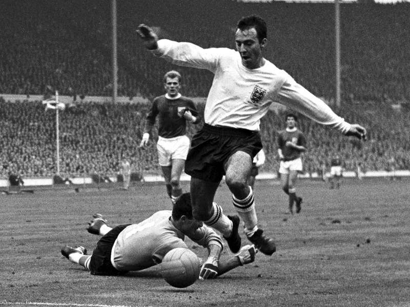 Jimmy Greaves skips past Yugoslavian goalkeeper Milutin Soskic during the match between England and the rest of the world at Wembley Stadium in 1965. AP