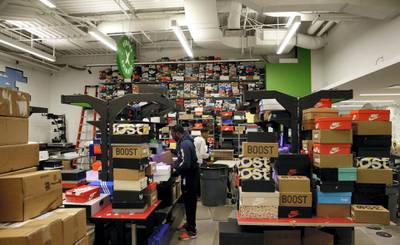 The authenticating room for sneakers is viewed at Stock X on January 10, 2018 in Detroit, Michigan. - This bag was sold for $1200 USD and the money will be refunded to the seller. StockX is a live auction site for resale of high-end sneakers, handbags, streetwear and watches. StockX experts authenticate items sold through their site. (Photo by JEFF KOWALSKY / AFP) / With AFP Story by Luc OLINGA