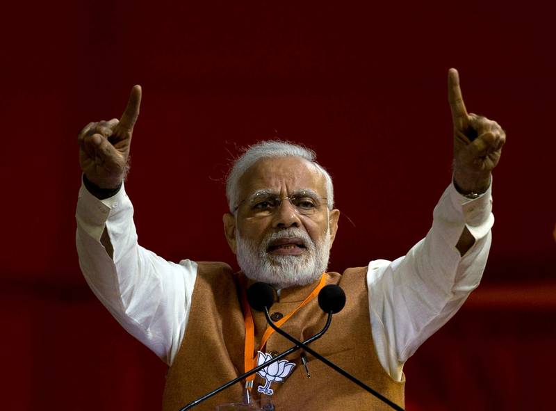 Indian Prime Minister Narendra Modi gestures as he speaks during an election campaign rally in Hyderabad, India, Monday, Dec. 3, 2018. Elections in Telangana state will be held on December 7. (AP Photo/Mahesh Kumar A.)
