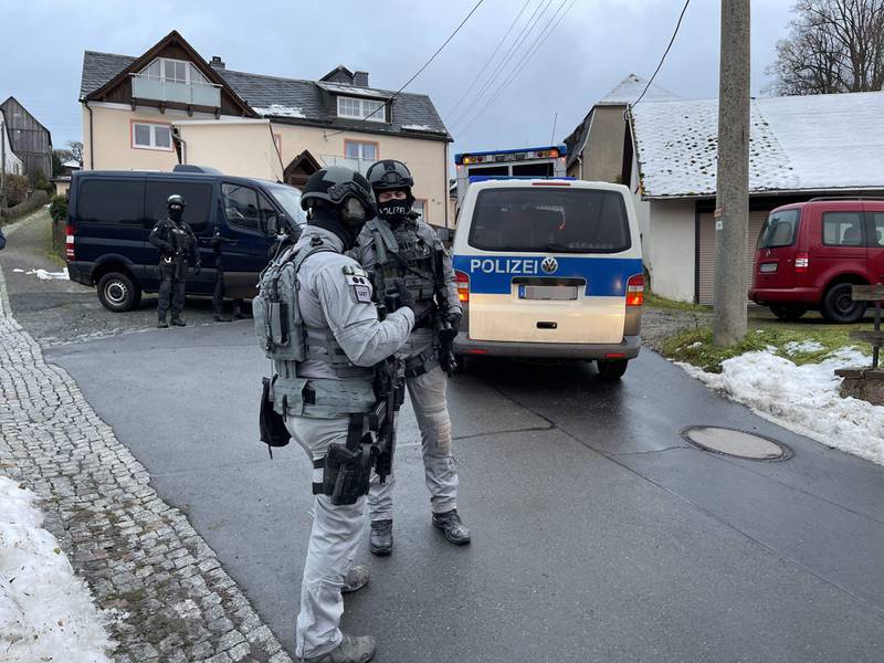 German special police forces patrol in Bad Lobenstein in  eastern Germany as part of nationwide early morning raids. AFP