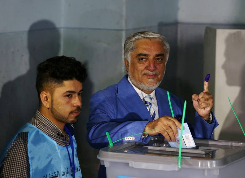 Afghan presidential candidate Abdullah Abdullah casts his vote at a polling station in Kabul, Afghanistan. Reuters