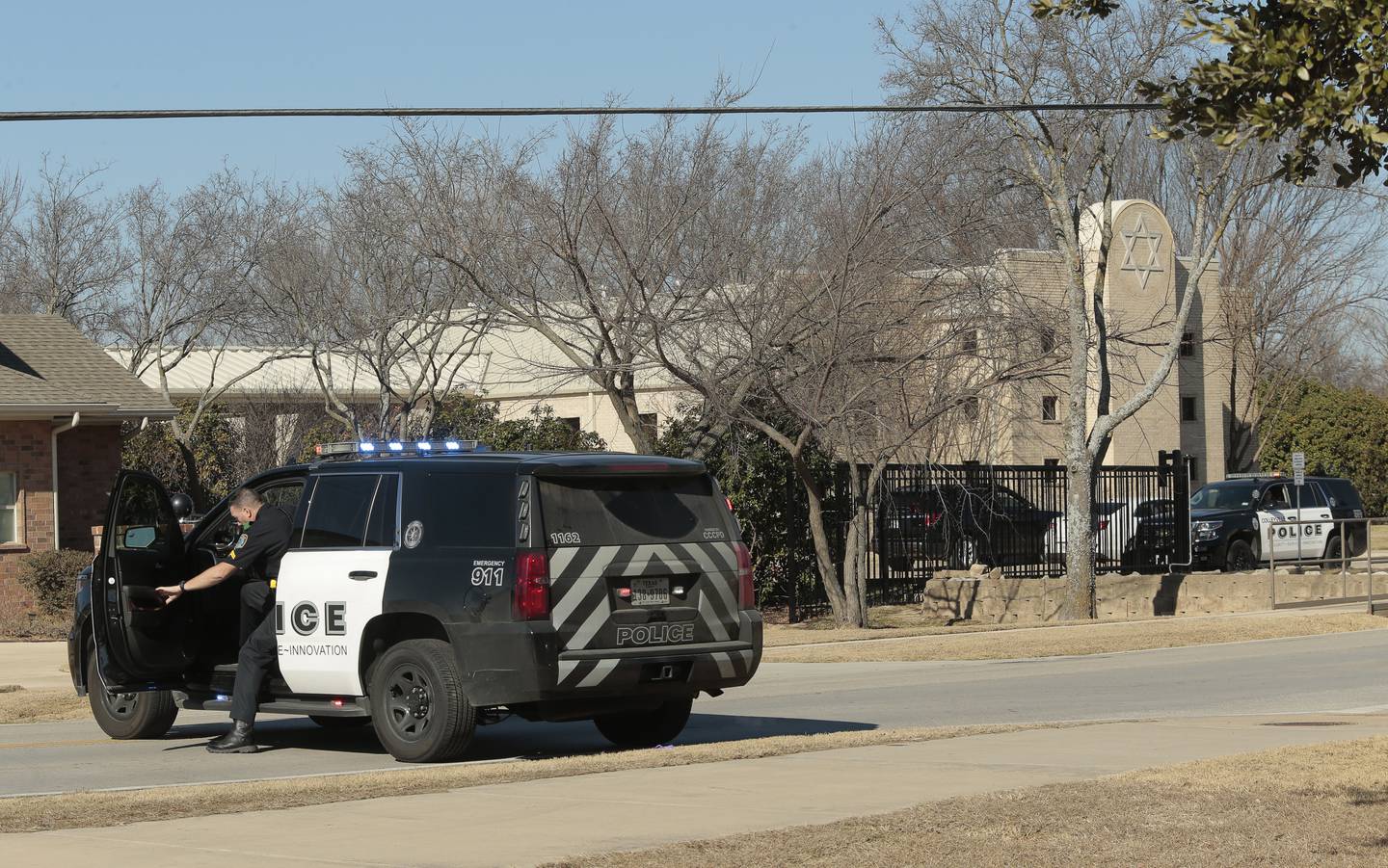 Law enforcement personnel investigate the hostage incident at Congregation Beth Israel Synagogue in Colleyville, Texas, January 16, 2022. EPA 