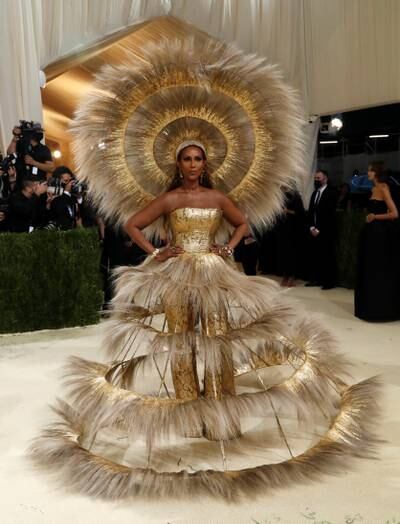Iman in gold Dolce & Gabbana x Harris Reed at the 2021 Met Gala. Reuters 