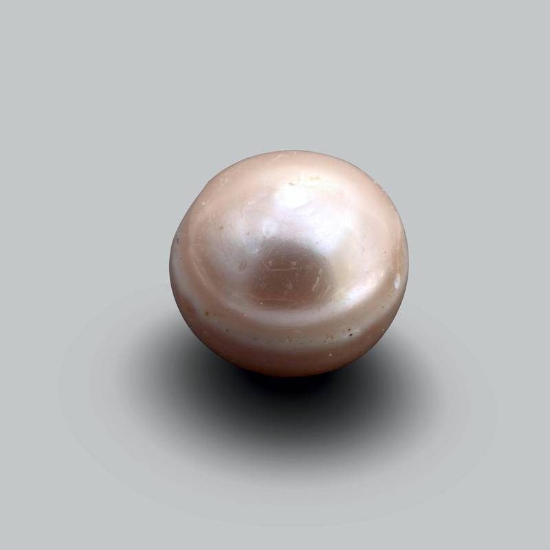 Natural Pearlc. 5800 BCE, Marawah, United Arab Emirates3 mm (diameter)HE.2017.00001Department of Culture and Tourism - Abu Dhabi Description:Marawah Island is home to one of the most important archaeological sites in the United Arab Emirates. It provides significant evidence to help us better understand the human communities that lived in the region during the Neolithic period, some 8,000 years ago. The site is comprised of at least seven mounds and excavations in some of them have revealed stone houses dating to c. 6000 BCE. These houses were used as burial chambers during later periods. Within one of the chambers, fragments of the oldest known human skeleton in the emirate of Abu Dhabi were found.It is, however, the discovery of a complete natural pearl, which dates to the period when the structures were used as houses, that is of enormous importance. Carbon 14 analysis on a sediment sample associated with the pearl indicates a date between 5,800 and 5,600 BCE. Prior to this discovery, the oldest known pearls in the UAE came from a site in Umm Al Quwain and one near Jebel al-Buhais in Sharjah. The Marawah Pearl is older than these making it the world’s oldest known pearl. It indicates that pearls were already gathered in the UAE  8,000 years ago.