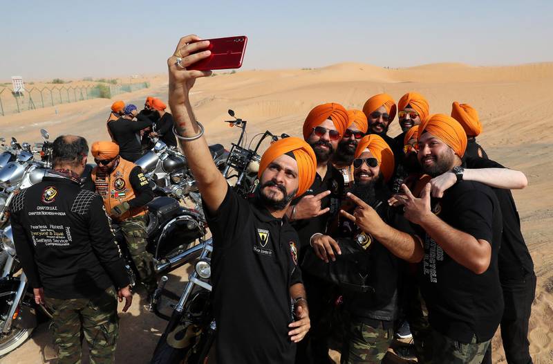 DUBAI ,  UNITED ARAB EMIRATES , May 17 – 2019 :- Members of the SMC ( Singhs Motorcycle Club UAE ) taking selfie during the morning bike ride in Dubai. They are into charity events also. This Club was founded by Gurnam Singh and Tanuj Singh in 2014. They ride every Friday morning in different parts of the UAE. ( Pawan Singh / The National ) For Arts&Culture/Big Picture/Instagram/Online. Story by Kate