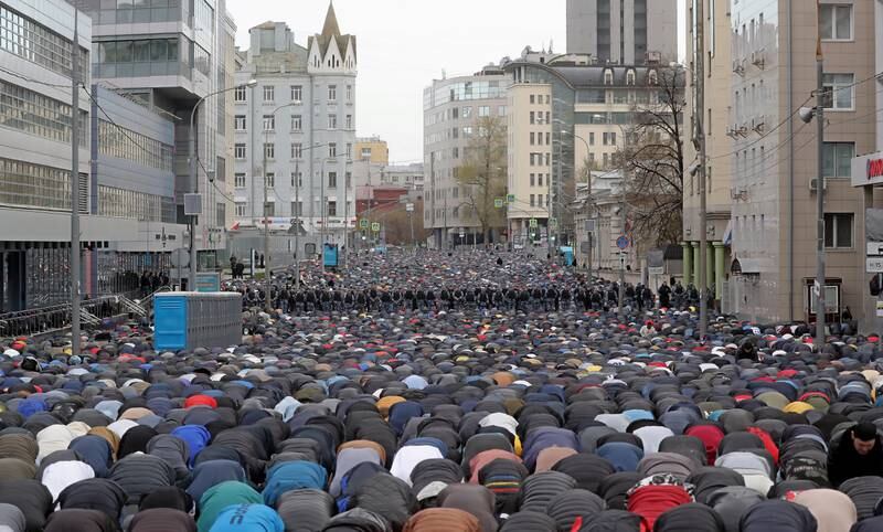 Muslims attend Eid Al Fitr morning prayers outside Central Sobornaya Mosque in Moscow. EPA