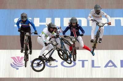 Australia's Sienna Pal, Keiley Shea of the US and Britain's Sienna Harvey crash during the BMX CUCI World Championships in Glasgow. Reuters