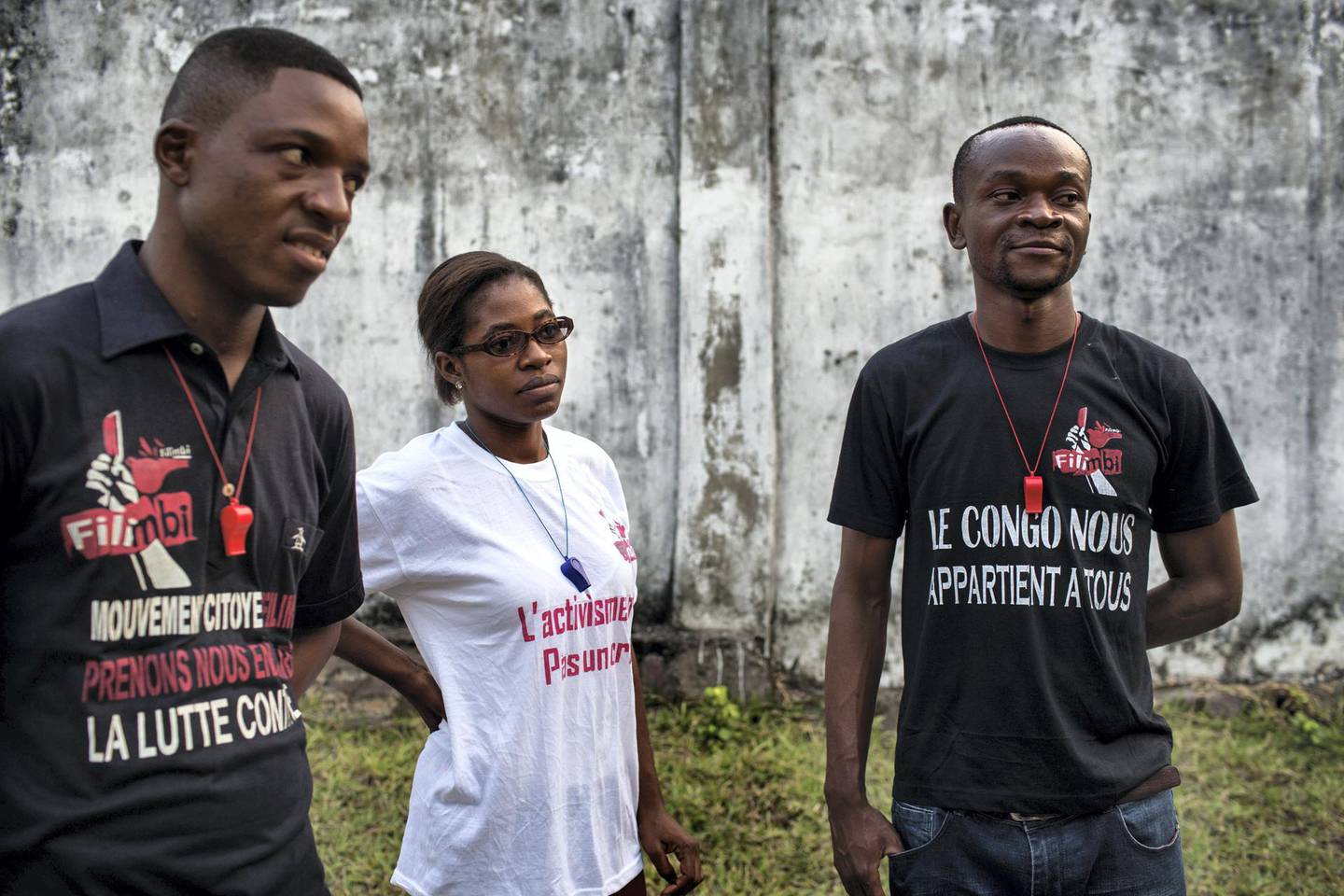 Left to right, Adonis Kabeya, 31; Audrey Kendra, 21; and Alain Mulumba Kabeya, 28;  of the Kinshasa cell of Filimbi, a pro-democracy group whose name means "whistle" in Swahili, at his home in Kinshasa, DRC, Aug. 14, 2018. After languishing nearly nine months in jail while they awaited a verdict, four of Filimbi's activists were recently convicted of “disturbing the public order” and “insulting the head of state” and sentenced to one year in prison.