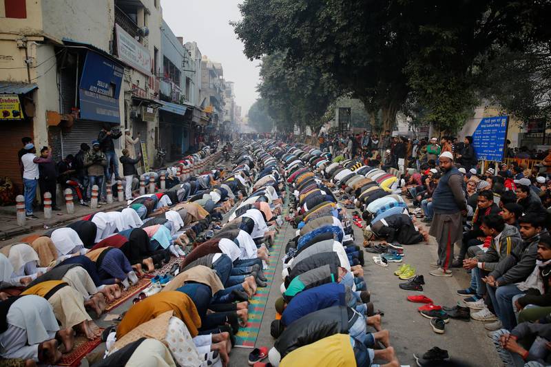 Muslim protesters pray on a road near the historic Red Fort in New Delhi, India, Friday, December 20, 2019. AP Photo/Altaf Qadri