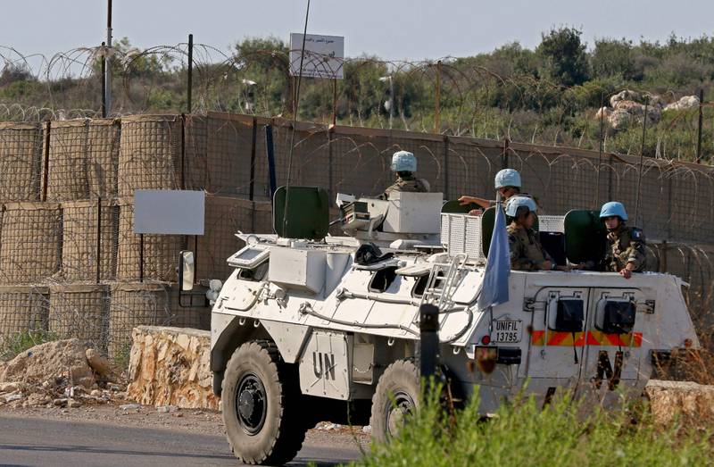 A Unifil convoy passes one of its outposts manned by Italian peacekeepers, during a patrol between the southern Lebanese towns of Naqura and Shamaa near the border with Israel.  AFP