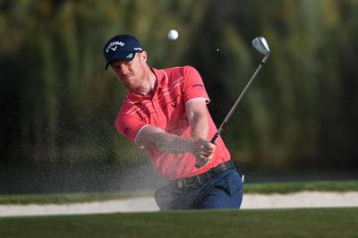 David Horsey hits his second shot on the 17th hole during the second round of the DP World Tour Championship. Ross Kinnaird / Getty Images