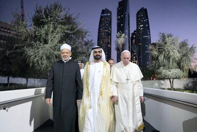 ABU DHABI, UNITED ARAB EMIRATES - February 04, 2019: Day two of the UAE papal visit - HH Sheikh Mohamed bin Rashid Al Maktoum, Vice-President, Prime Minister of the UAE, Ruler of Dubai and Minister of Defence (C), His Holiness Pope Francis, Head of the Catholic Church (R) and His Eminence Dr Ahmad Al Tayyeb, Grand Imam of the Al Azhar Al Sharif (L), arrive at the Human Fraternity Meeting, at The Founders Memorial.

( Mohamed Al Hammadi / Ministry of Presidential Affairs )
---