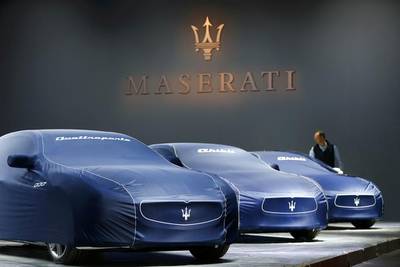 Maseratis in covers are ready for unveiling to the public when the Frankfurt International Motor Show opens in Germany. Kai Pfaffenbach / Reuters