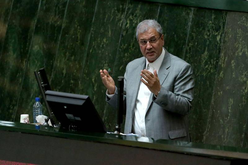 (FILES) In this file photo taken on March 13, 2018 Iranian Labor Minister Ali Rabiei speaks during a meeting of the Iranian parliament for his impeachment. - Rabiei was impeached today after months of mounting anger over the government's handling of an economic crisis which has deepened with the return of US sanctions. (Photo by ATTA KENARE / AFP)