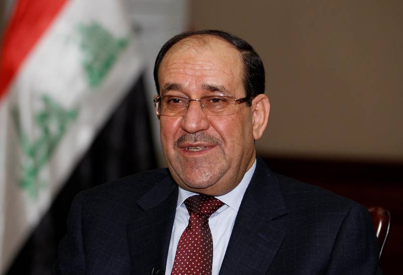 FILE PHOTO - Then Iraqi Prime Minister Nouri al-Maliki speaks during an interview with Reuters in Baghdad in this January 12, 2014. REUTERS/Thaier Al-Sudani/File Photo