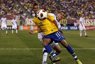 An 18-year-old Neymar, left, tussles with USA's Alejandro Bedoya on his international debut in July 2010 in East Rutherford, New Jersey. Getty