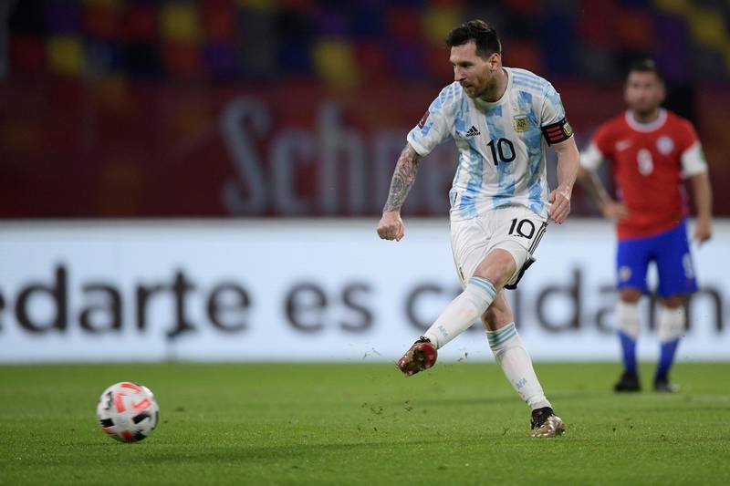Lionel Messi scores a penalty for Argentina against Chile. EPA