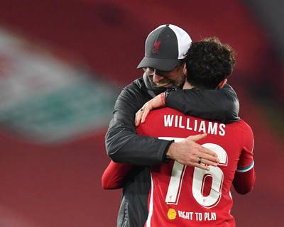 Juegen Klopp celebrates with Neco Williams after the match. Reuters