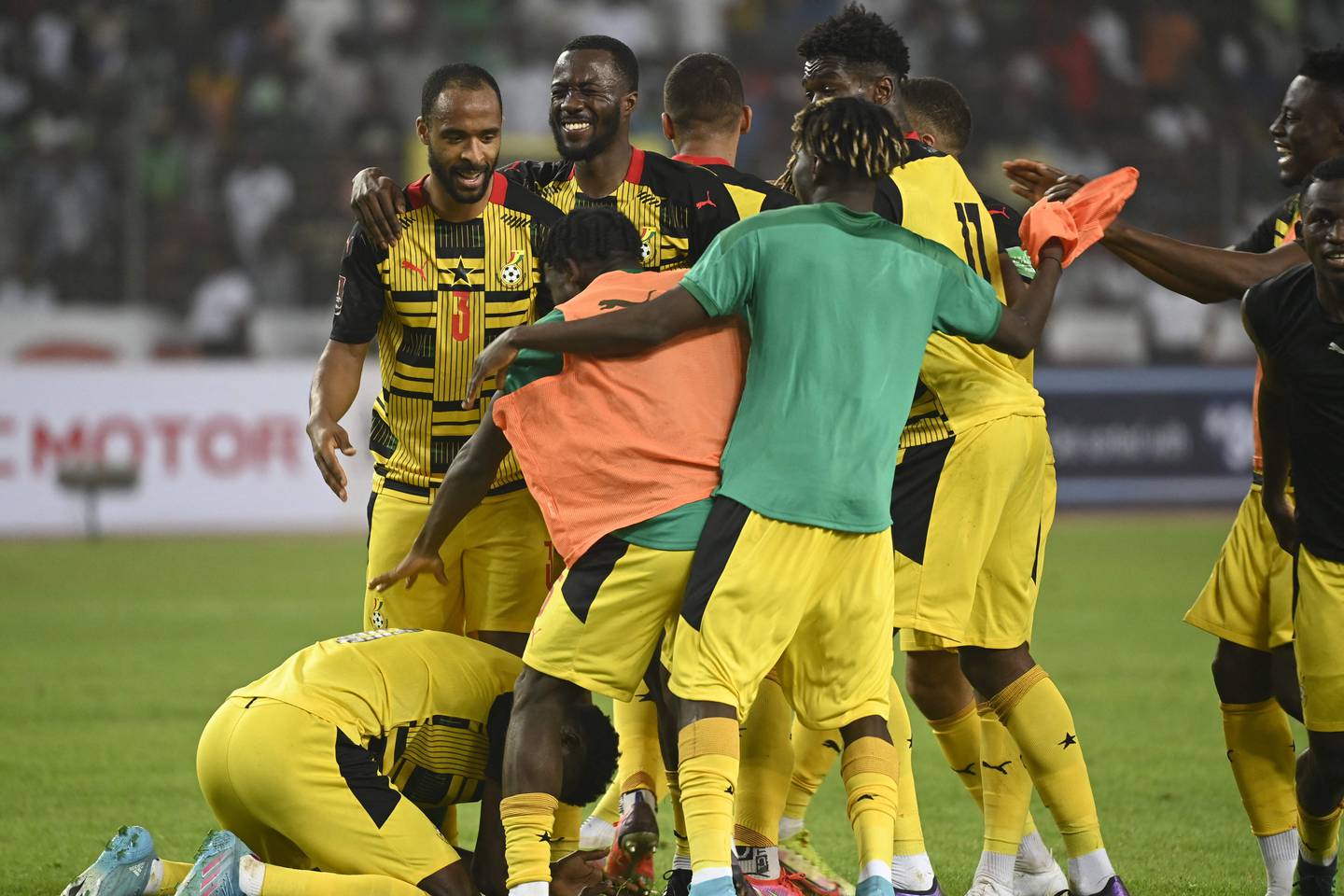 Ghana players celebrate their victory over Nigeria. AFP