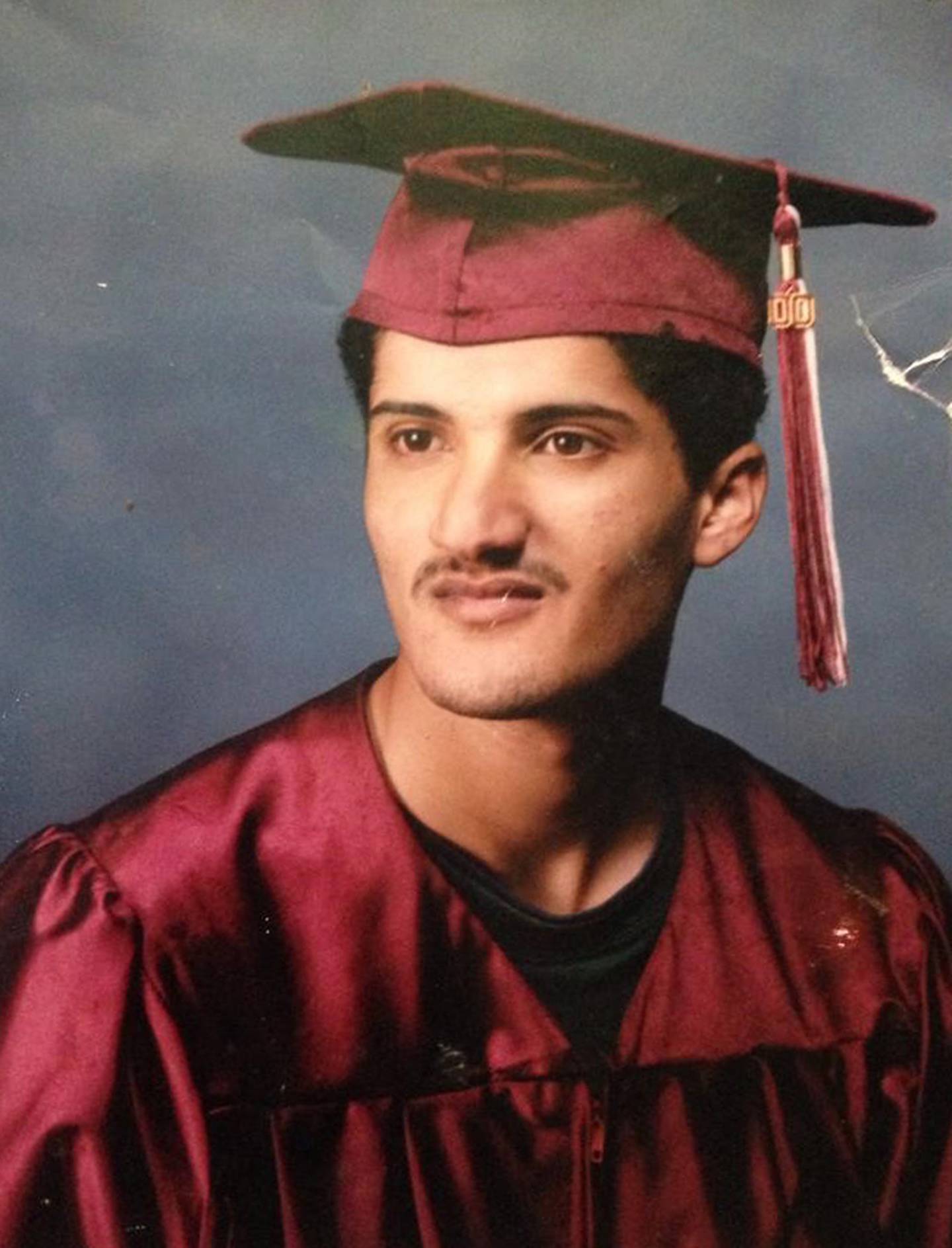 Amer Ghalib, above at his high school graduation, might have toiled for years on the factory floor like his father and grandfather but for an overriding desire to make something more of himself. Photo: Amer Ghalib