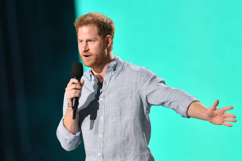 Co-Chair Britain's Prince Harry, Duke of Sussex, speaks onstage during the taping of the "Vax Live" fundraising concert at SoFi Stadium in Inglewood, California, on May 2, 2021. The fundraising concert "Vax Live: The Concert To Reunite The World", put on by international advocacy organization Global Citizen, is pushing businesses to "donate dollars for doses," and for G7 governments to share excess vaccines. The concert will be pre-taped on May 2 in Los Angeles, and will stream on YouTube along with American television networks ABC and CBS on May 8. / AFP / VALERIE MACON                       
