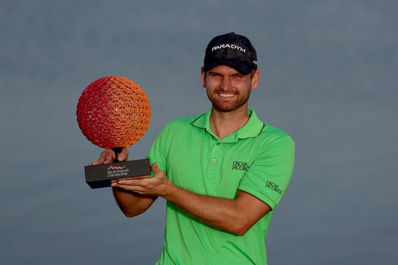 Daniel Gavins of England with the Ras Al Khaimah Championship trophy after his one-shot victory on Day Four of the tournament at Al Hamra Golf Club on February 5, 2023. Getty 