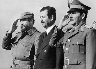 Saddam Hussein, then Iraq's vice president, stands with Cuban leader Fidel Castro, left, and defense minister Raul Castro, January 30, 1979 in Havana. AFP