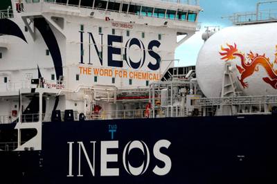 (FILES) This file photograph taken on September 27, 2016, shows an INEOS logo on the JS Ineon Insight ship as it arrives to dock at Grangemouth in Scotland.  British energy group BP, hit hard by the coronavirus pandemic slashing demand for oil, announced June 29, 2020,  the sale of its petrochemical business to rival Ineos for USD 5.0 billion (4.4 billion euros).
 / AFP / Andy Buchanan
