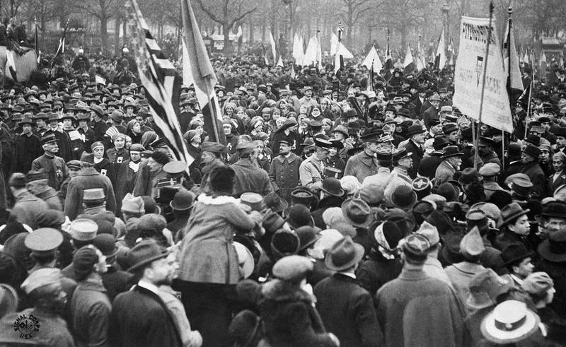 People in the streets of Paris, France, celebrate the signing of the Armistice.