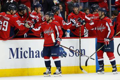 Oct 7, 2017; Washington, DC, USA; Washington Capitals left wing Nathan Walker (79) celebrates with teammates on the bench after scoring his first NHL goal during the second period against the Montreal Canadiens at Verizon Center. Mandatory Credit: Amber Searls-USA TODAY Sports