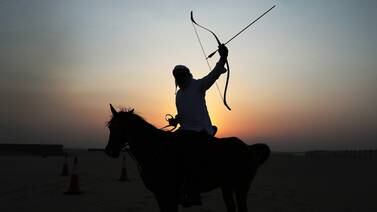 Saeed Al Dharif teaches mounted archery at his farm in Al Wathba, Abu Dhabi. Pawan Singh / The National