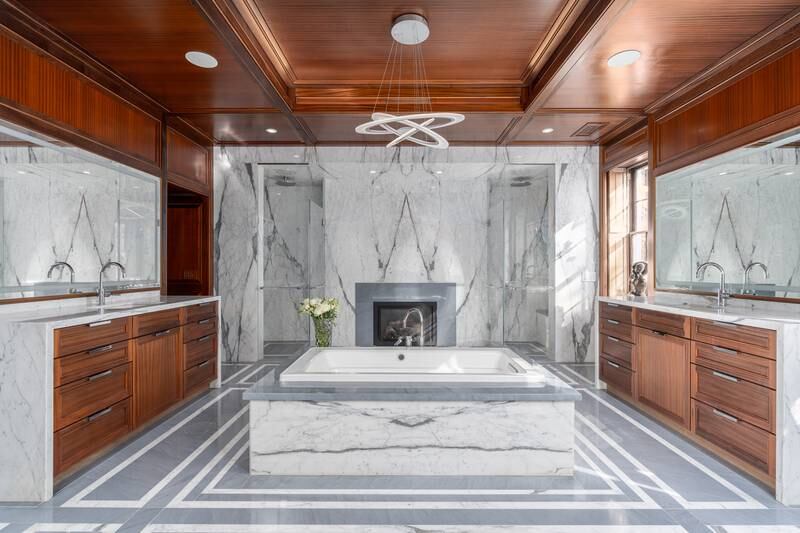 A marble-clad bath tub in the master bathroom of the main house. Photo: Sotheby’s International Realty
