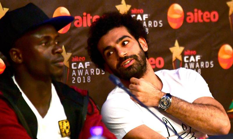 Mohamed Salah and Sadio Mane, who are nominees for the CAF Best Player Award, chat as they address a press conference in Dakar. AFP