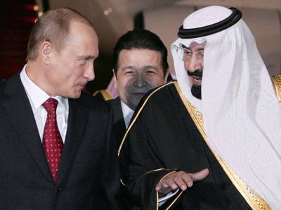 Russian President Vladimir Putin and Saudi King Abdullah during an official welcoming ceremony at the airport in Riyadh February 11, 2007. AFP Photo 