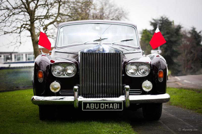Flags of Abu Dhabi proudly flying on the original Rolls Royce Phantom used by Sheikh Zayed as his state vehicle. Mr Khan plans to write a book about the discovery.