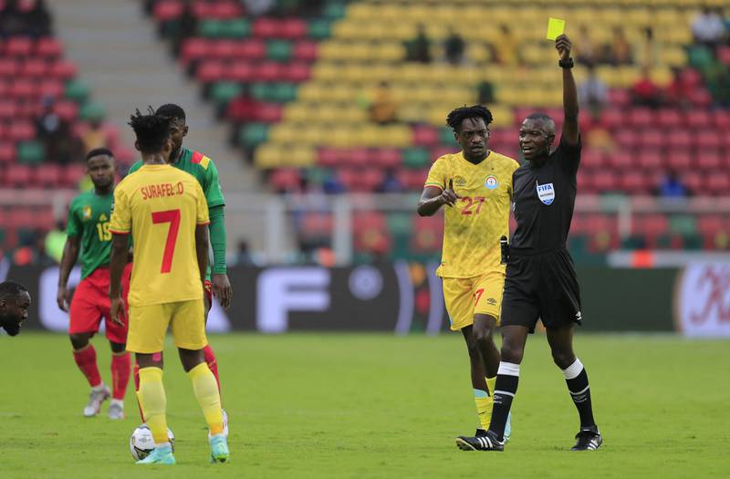 Ethiopia's Surafel Dagnachew is shown a yellow card by referee Ndala Ngambo. Reuters