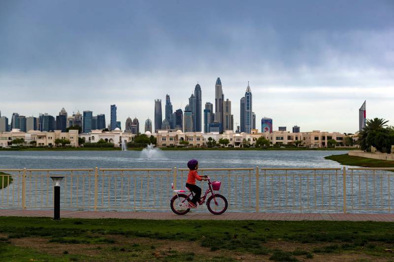 Dubai, United Arab Emirates - April 10, 2019: Dark clouds over the Dubai skyline. Wednesday the 10th of April 2019. The Springs, Dubai. Chris Whiteoak / The National
