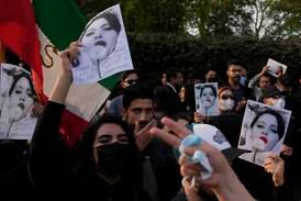Violent protests injure police outside Iran embassy