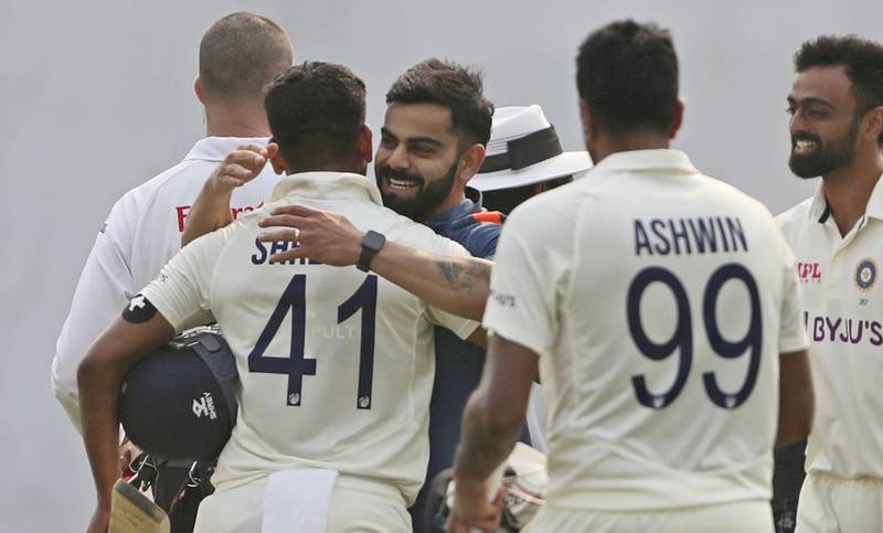 India's Ravichandran Ashwin, Shreyas Iyer and Virat Kohli celebrate their victory over Bangladesh in the second Test on Sunday. AP