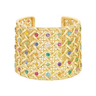 A woven yellow gold My Dior cuff, with diamonds and coloured gemstones, has an estimate of £30,000-£50,000. Courtesy Sotheby's