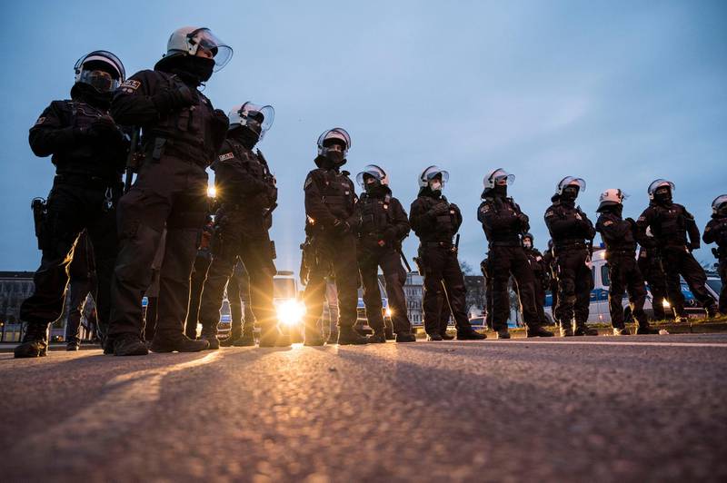 Police officers break up a demonstration on March 20, 2021 in Kassel, Germany.  Getty Images