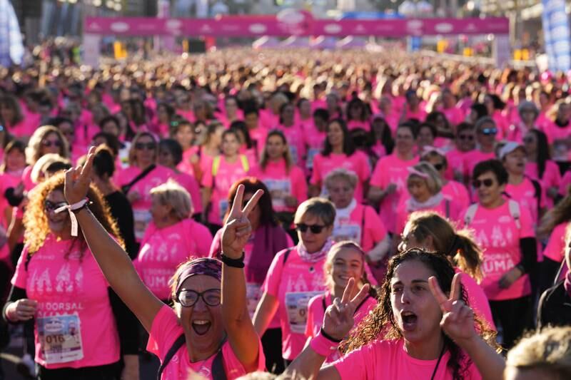 Women take part in a breast cancer awareness run in Spain. EPA