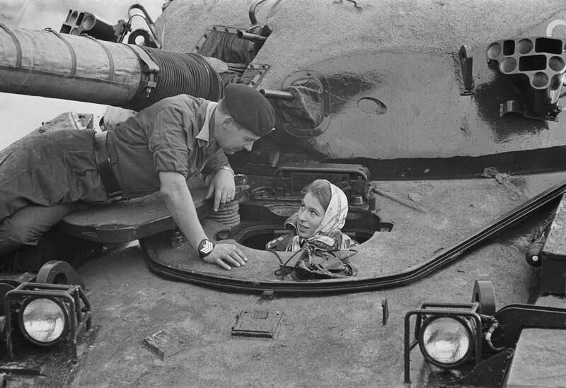 Princess Anne sits in a tank while visiting troops in Germany, in 1969.